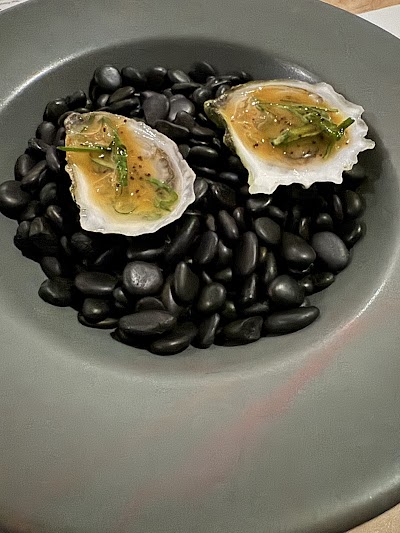 Raw oyster with plum and lemon verbena