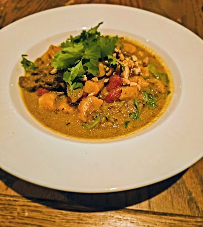 Curried Goat with Sweet Potato Gnocchi and Cashews